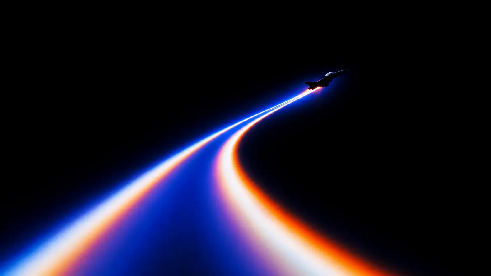 A sleek futuristic aircraft flying along an enormous sweeping curved trail of light, the glowing path dominating the lower half of the composition and bending dramatically toward the horizon, deep black sky, saturated royal blue and electric blue illumination, soft white edges with subtle orange, pink and violet chromatic aberration, tiny aircraft silhouetted against the glow, extreme scale contrast, long exposure aesthetic, dreamy soft focus, analog film grain, minimalist surrealism, cinematic wide composition, 16:9. STYLE LOCK: surreal retro-futuristic aviation photography, extreme minimalism, enormous negative space, tiny subject against monumental scale, electric cobalt blue and deep indigo palette, black voids, luminous white cores, orange and magenta chromatic fringes, long-exposure light trails, smooth atmospheric gradients, heavy optical bloom, soft diffusion, slight chromatic aberration, subtle analog film grain, dreamy experimental photography, high contrast, abstract geometric perspective, no realistic environment, no text, no UI, no stars, cinematic composition
