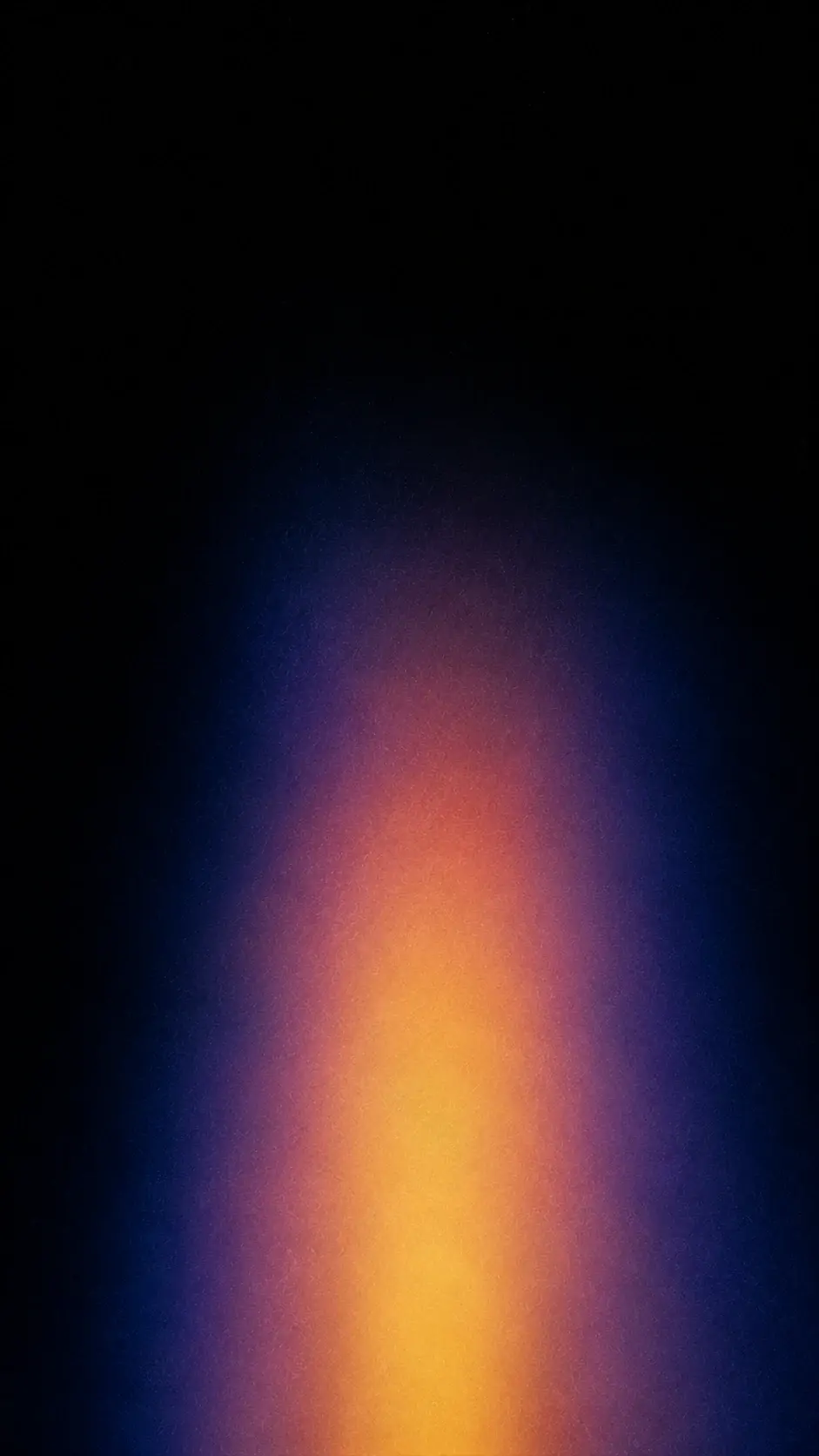 Abstract minimalist color photograph, 9:16 portrait, nearly pure black frame, a huge soft vertical column of diffused color occupies only the lower two-thirds, irregularly narrowing and widening as it rises, deep midnight blue at the outer edges transitioning through plum and dusty violet into warm gold and muted amber near the center, no sharp silhouette, colors softly radiating outward, hazy bloom, strong but delicate film grain, subtle chromatic noise, tactile analog texture, luxurious dark editorial aesthetic, no objects, no text